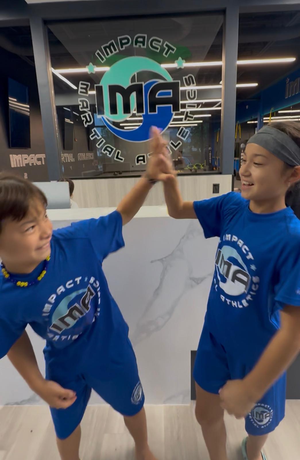 Kids practicing boxing and martial arts at IMA Summer Camp in Davie FL